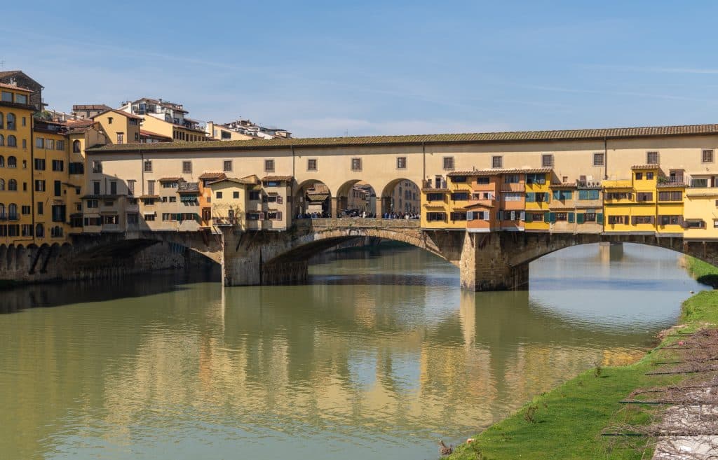 The Ponte Vecchio in Florence: the old bridge covered with colorful square boutiques.