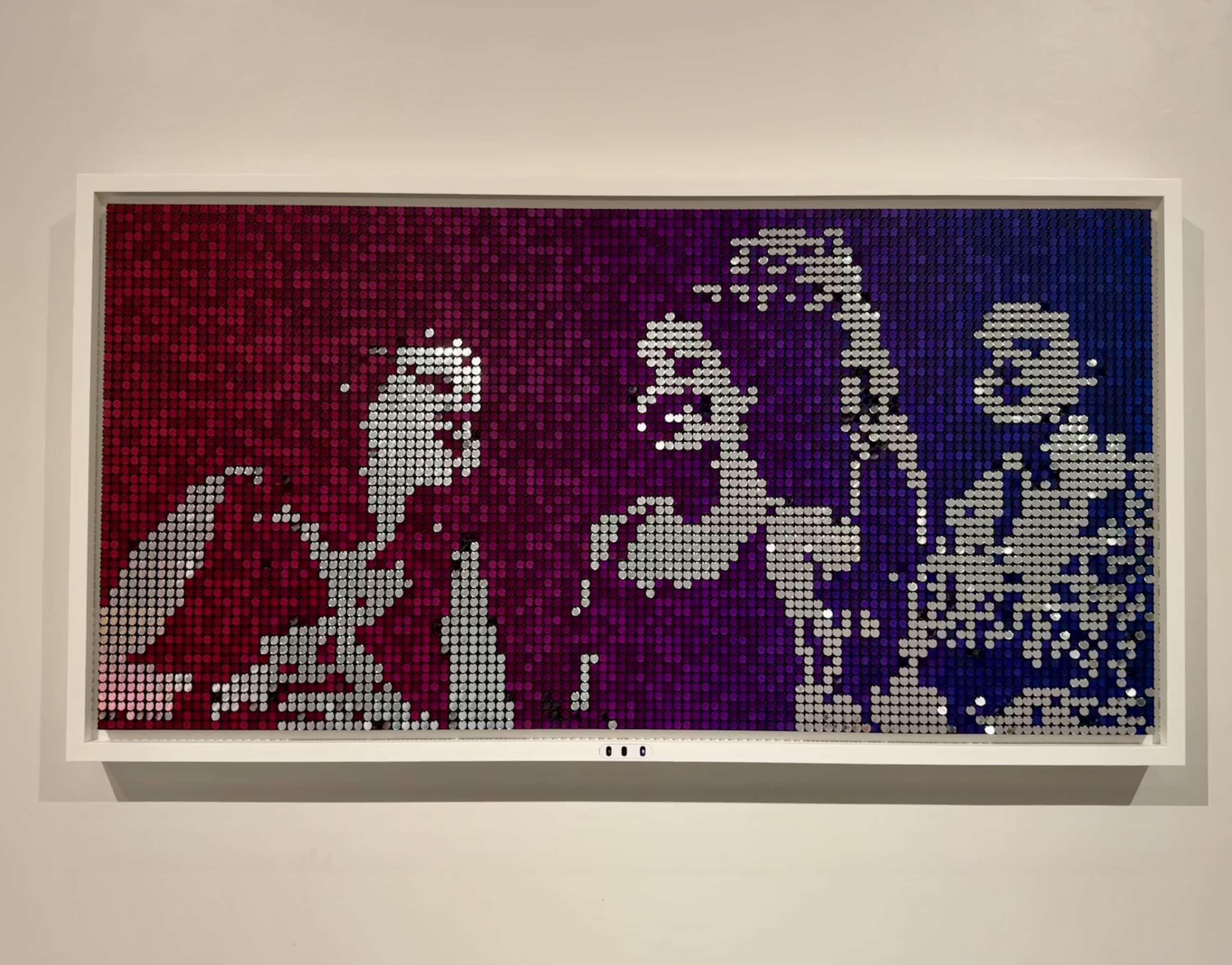 A piece of artwork that looks like three girls standing in a square of purple and silver discs.
