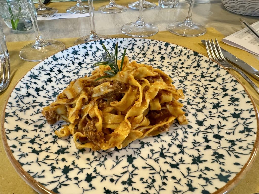 A plate of pasta with traditional ragu (meat sauce).