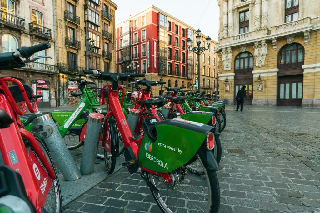 A row of ebikes for rent in Bilbao.