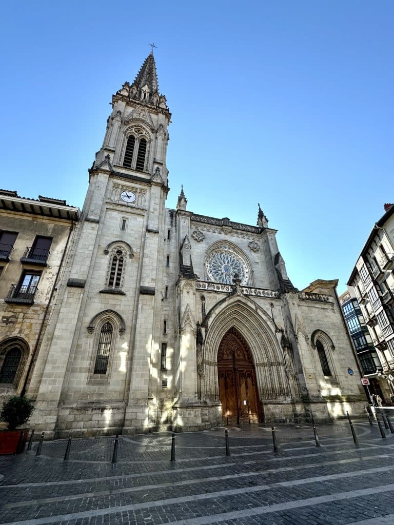 A tall gothic church with a tower in Bilbao.