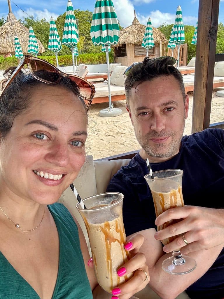 Kate and Charlie sipping from coffee milkshakes.