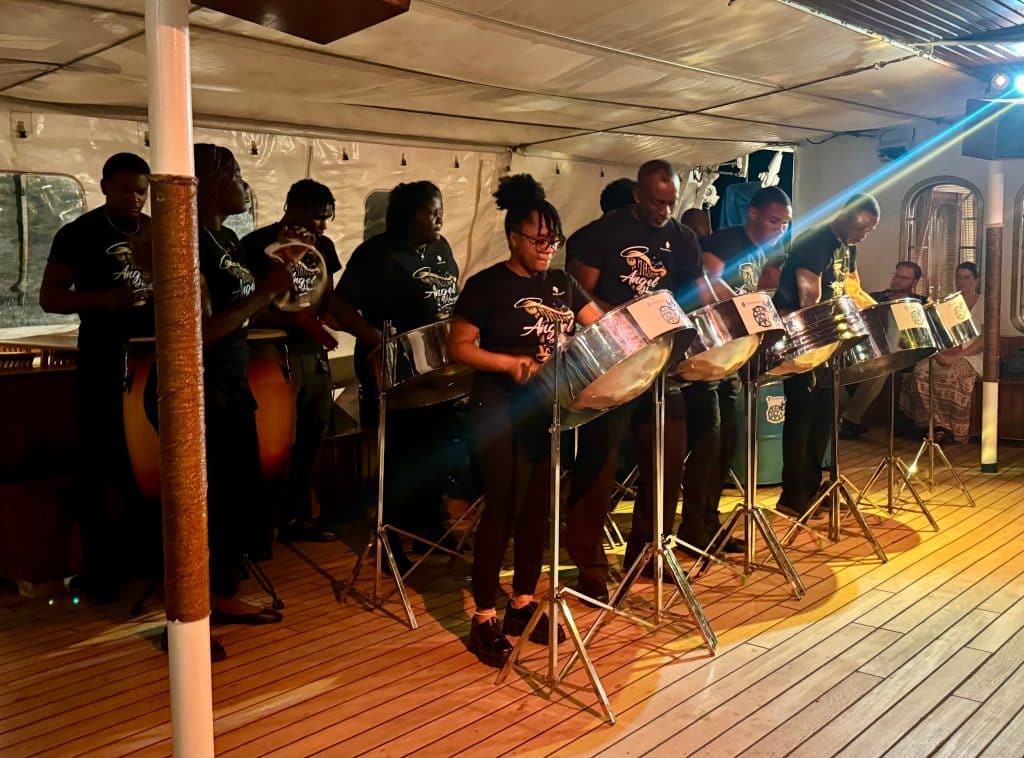 A large steel drum band performing on the ship.