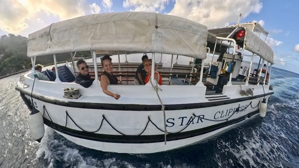A fisheye view of the Royal Clipper tender close up, Kate and two friends smiling for the camera.